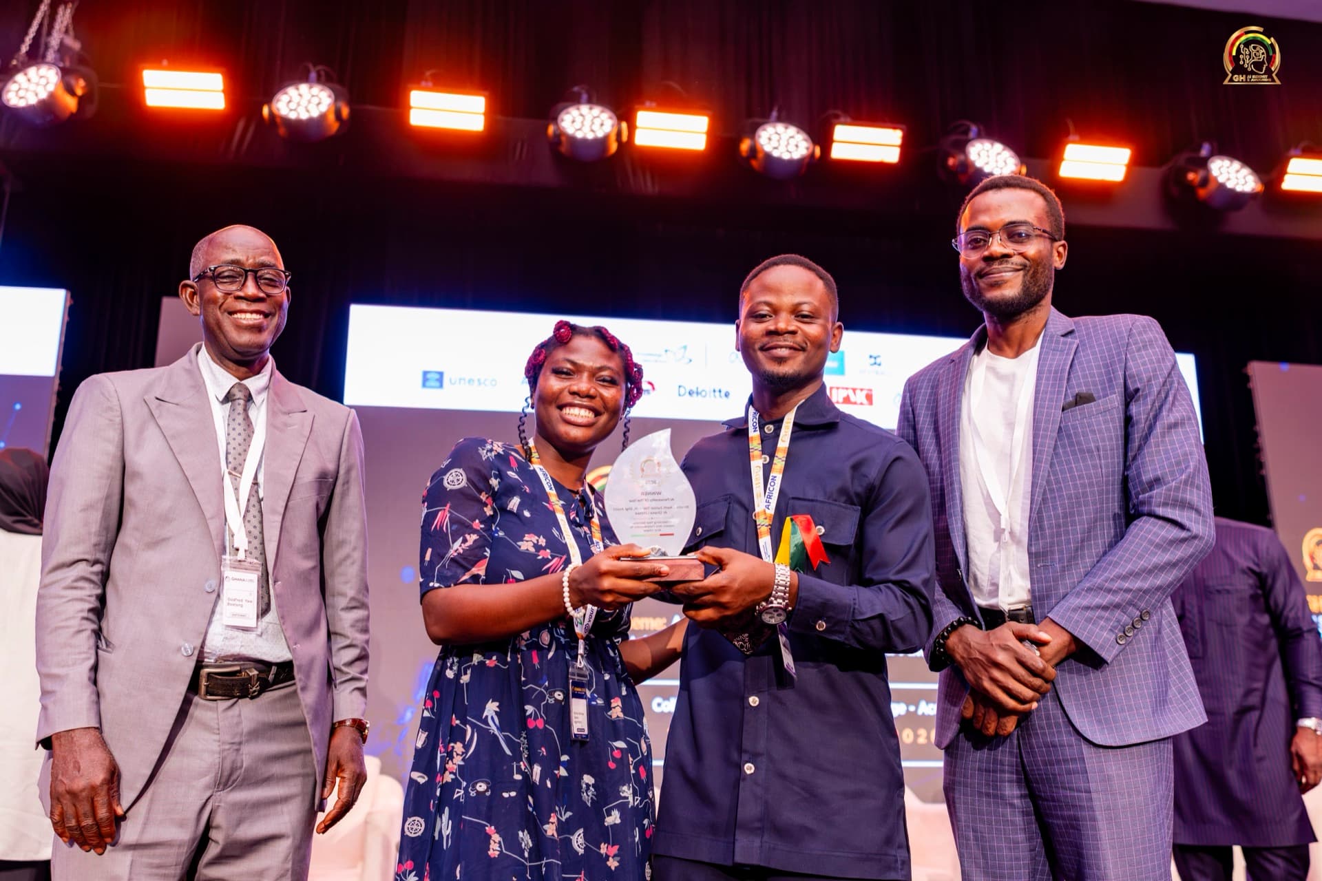 Stephen Totimeh celebrating the award with colleagues